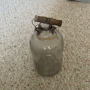vintage jar with a wood handle